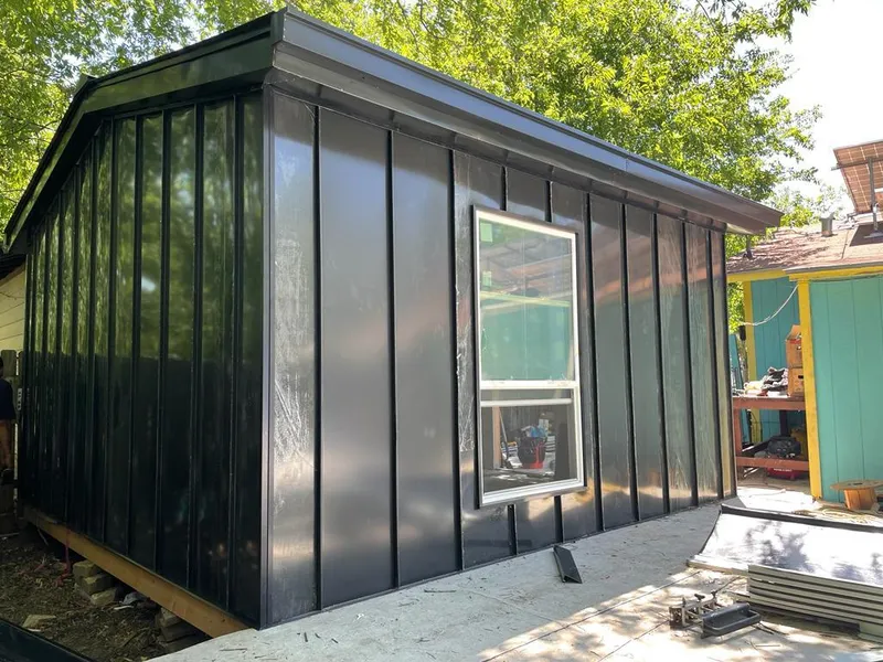 Black standing seam metal wall panels for Roof Inspection in Mission